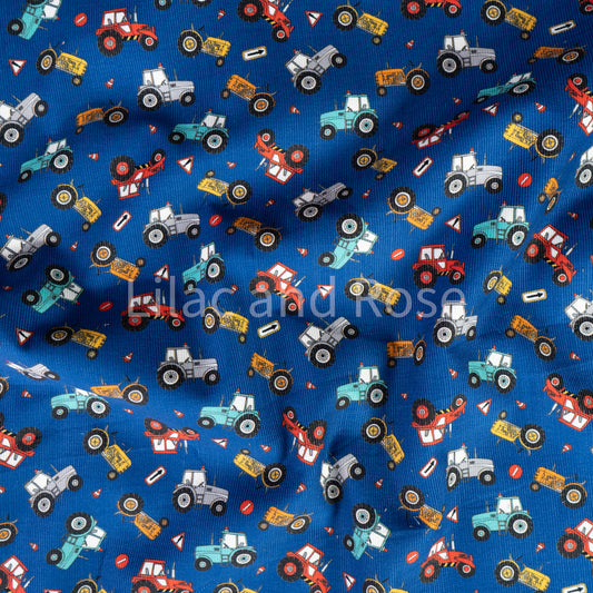 21 Wale Needlecord -  Tractors on Blue